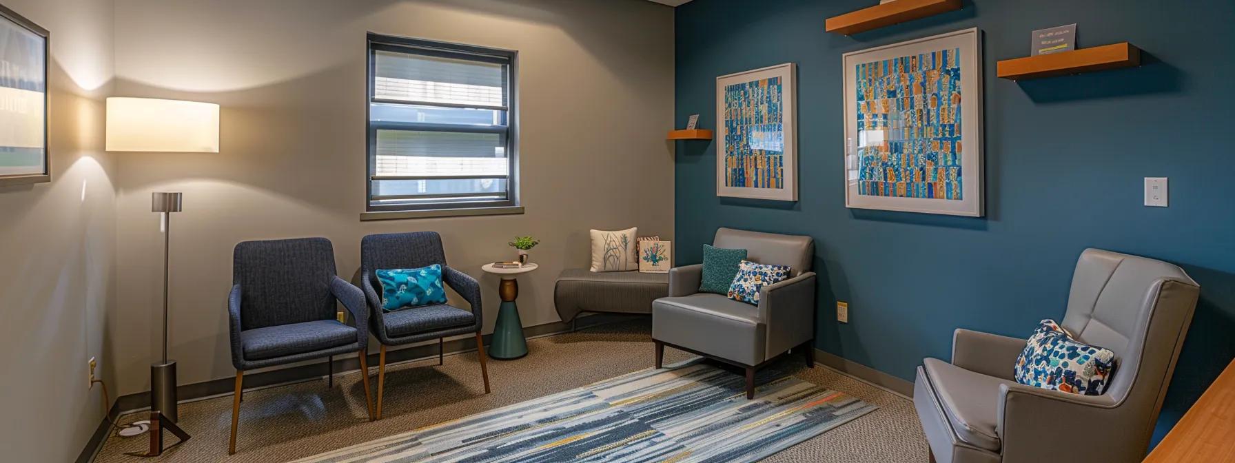 a room with chairs and a table for addiction treatment in MA